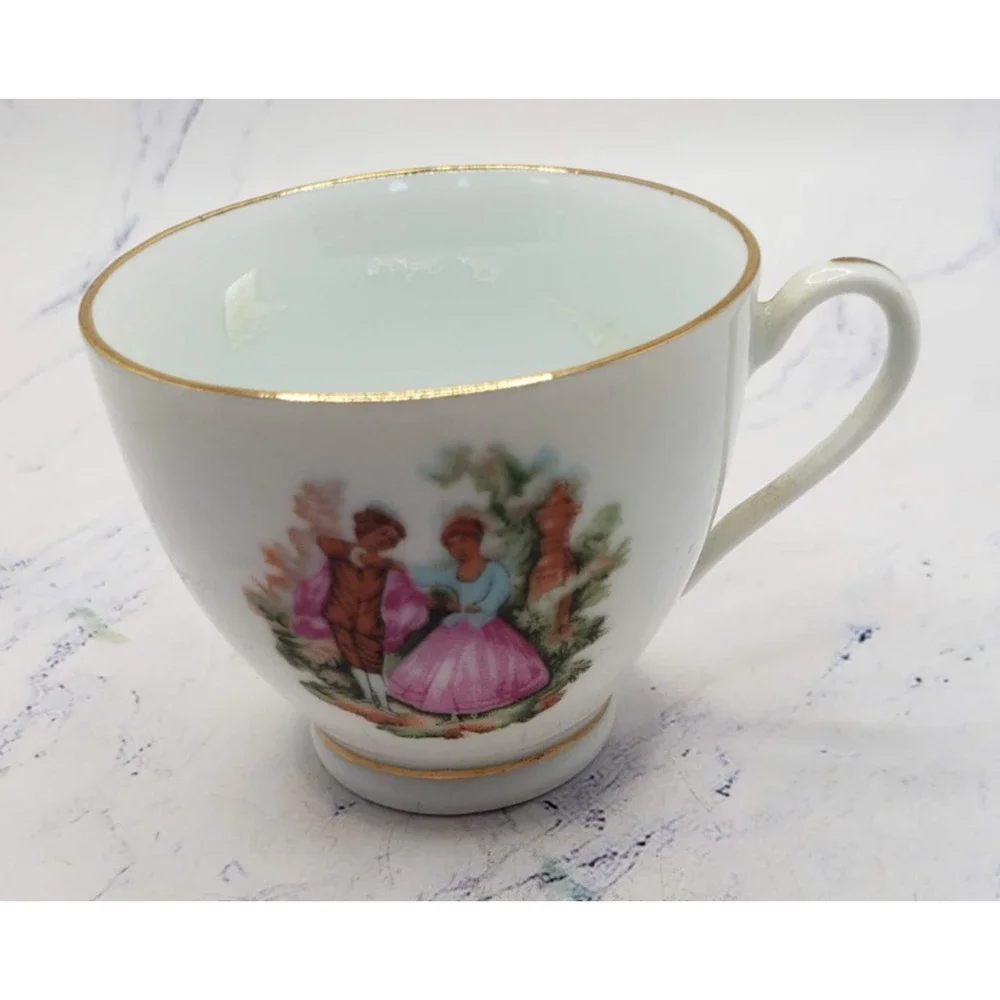 Vintage Porcelain Tea Cup and Saucer White w/Gold Trim and Dancing Couple